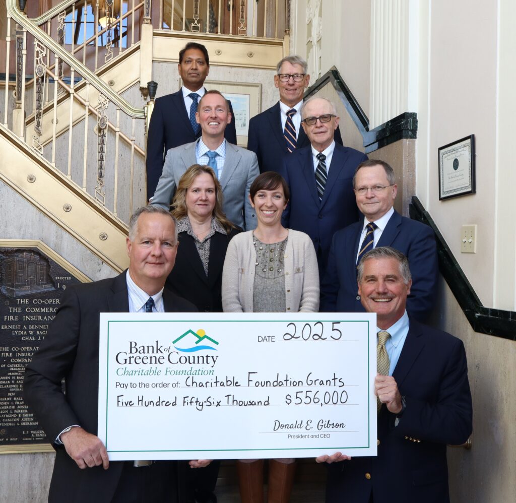 Bank Board Directors & Employees Holding Big Check